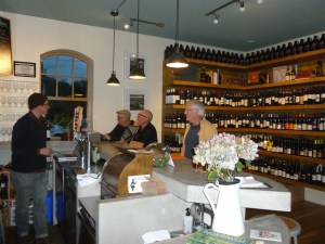 Matt and Chuck toast to each other's health and that of the Earth.