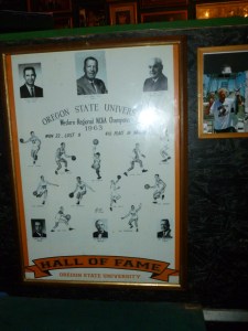 The Final Four plaque with Coach Paul Valenti's and Athletic Director, Slats Gill's pictures.