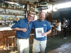 Mansfield with Brian Block, one of the owners and the traditional Beerchaser logo.