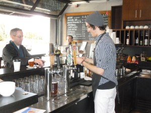 ____ serving a beer.