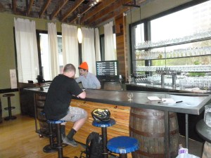 Bartender Luke and the bar at The Upper Lip