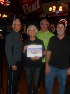 The owners of Zims with Thebeerchaser logo.