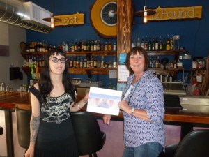 Julia the bartender with Sharon ___ Robbins and Thebeerchaser logo.