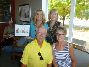 The Sengers with co-owner, Kristy Holtz and ___ in the back