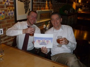 Beer-drinkers and financial experts Jones and Eller with Thebeerchaser logo