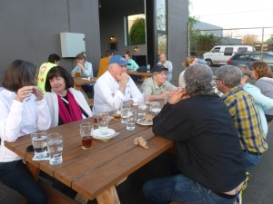 Our group sampling the food and beer after the walk around the neighborhood