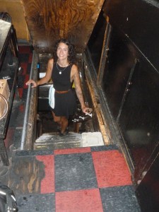 Mary Kate opened the trap door and shows the steps descending to the cellar