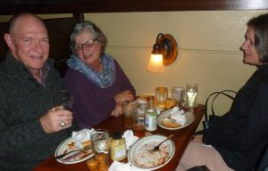 Dave and Lynne Booher chuckling as they remember my meager attempts to write at a graduate level...