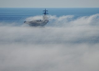 US_Navy_101105-N-5684M-121_The_aircraft_carrier_USS_Ronald_Reagan_(CVN_76)_maneuvers_through_fog_in_the_Pacific_Ocean